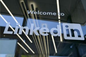 On a building, "Welcome to LinkedIn" is written on glass.